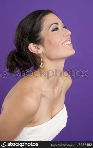 Bride Excited Vertical Composition White Gown on Purple Background. Beautiful Brunette Bride