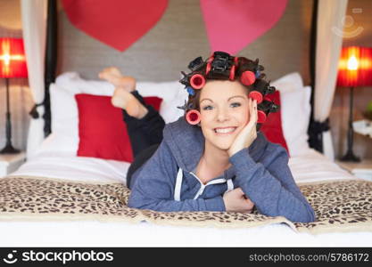 Bride Getting Ready For Wedding With Hair In Curlers