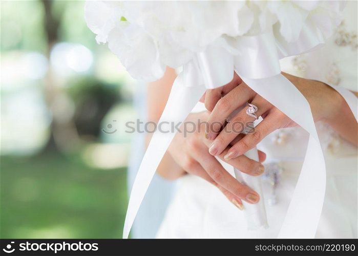 Bride hand with bride rings - Selective focus.