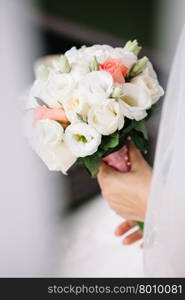 Bride holding a bouquet of flowers, wedding bouquet