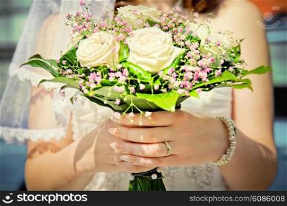 bride holding her wedding bouquet
