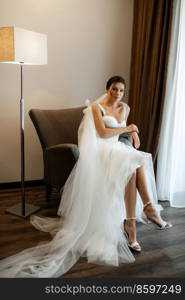 bride in a white dress at the training c&inside the hotel