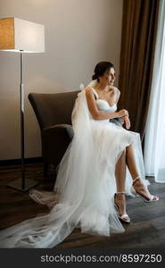 bride in a white dress at the training c&inside the hotel