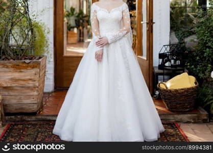 bride in a white wedding dress is waiting for the groom at the ceremony. the bride in a white wedding dress is waiting for the groom at the ceremony