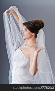 Bride in wedding dress in studio shooting