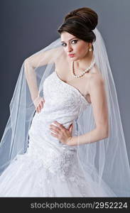 Bride in wedding dress in studio shooting