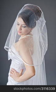 Bride in wedding dress in studio shooting