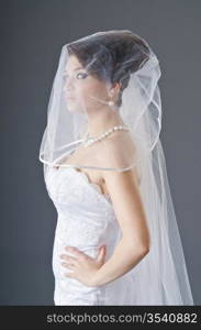 Bride in wedding dress in studio shooting