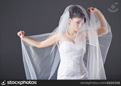 Bride in wedding dress in studio shooting