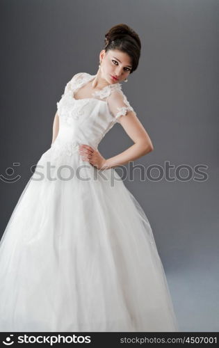 Bride in wedding dress in studio shooting