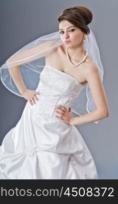 Bride in wedding dress in studio shooting