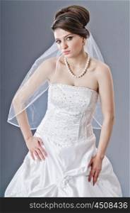 Bride in wedding dress in studio shooting