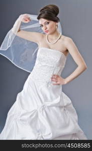 Bride in wedding dress in studio shooting