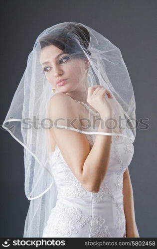 Bride in wedding dress in studio shooting