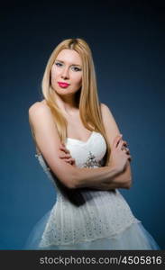 Bride in white dress in studio