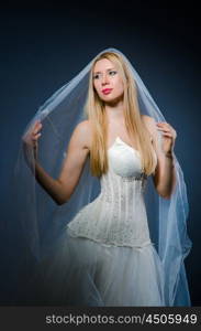 Bride in white dress in studio