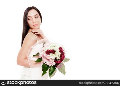 Bride is posing with bouquet over white isolated background
