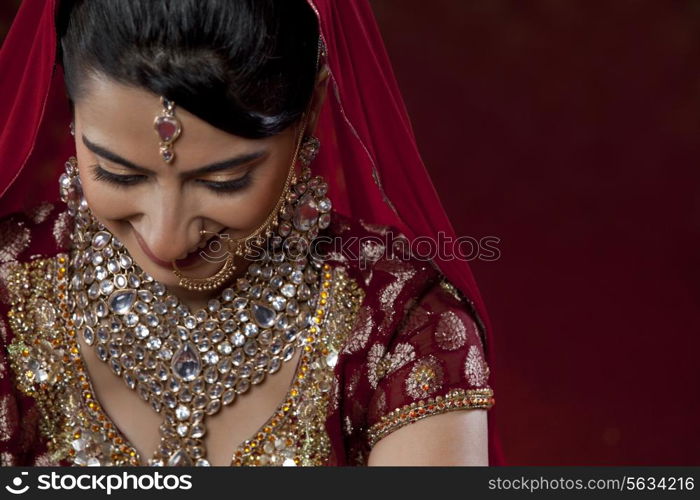 Bride looking down and smiling