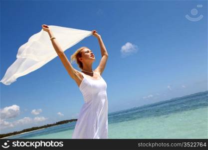 Bride on the beach with white stole