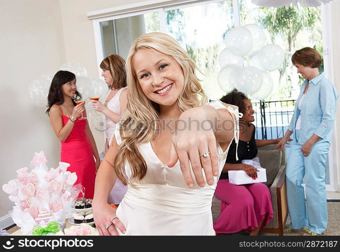 Bride Showing Off Ring at Bridal Shower