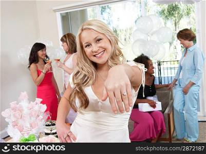 Bride Showing Off Ring at Bridal Shower