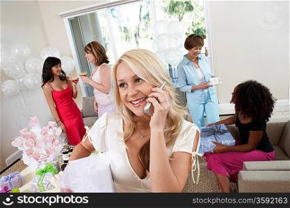 Bride Talking on Cell Phone During Bridal Shower