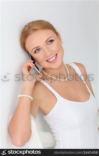Bride talking on mobile phone