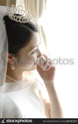 Bride talking with cell phone