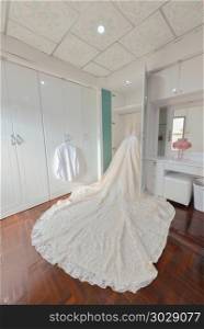 Bride wedding dress in a white room, interior design