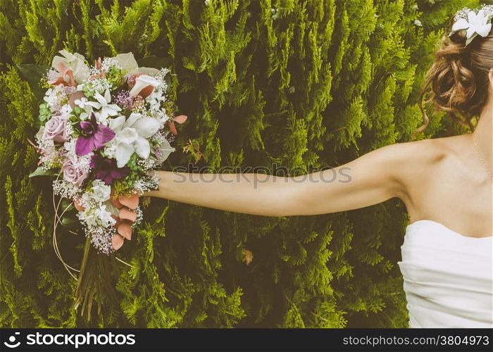 Bride with a Beautiful Bouquet of Flowers