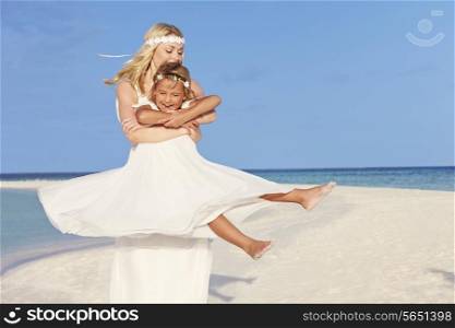 Bride With Bridesmaid At Beautiful Beach Wedding