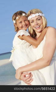 Bride With Bridesmaid At Beautiful Beach Wedding