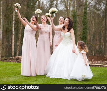 Bride With Bridesmaids On Wedding Day