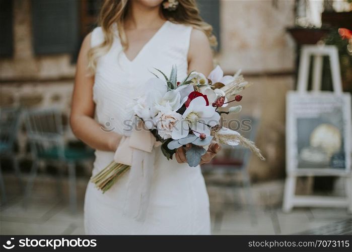 Bride with flowers in your hand