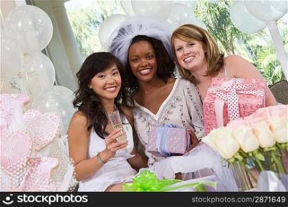 Bride with friends celebrating bridal shower