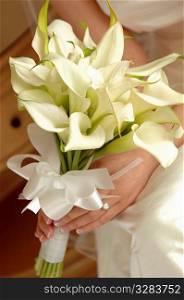 Bride with wedding bouquet.
