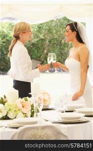 Bride With Wedding Planner In Marquee