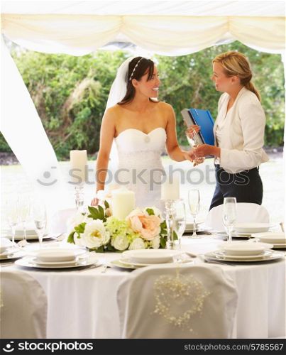 Bride With Wedding Planner In Marquee