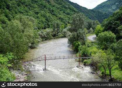 Bridge and river in mountain valley in Serbia