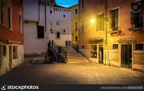 Bridge and street in Venice at night