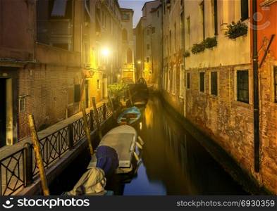 Bridge and street in Venice at night