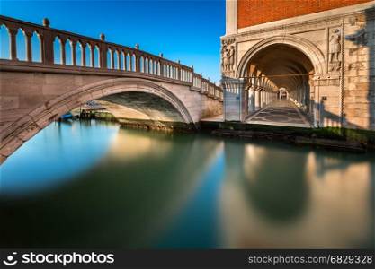 Bridge, Canal and Doge's Palace Illuminated by Rising Sun at Sunrise, Venice, Italy
