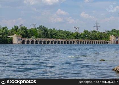 bridge hydroelectric plant on blue sky background