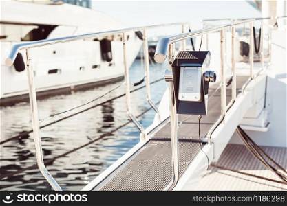 Bridge of private luxury ship with modern intercom system on entry in Marina of Cannes, French Riviera, France