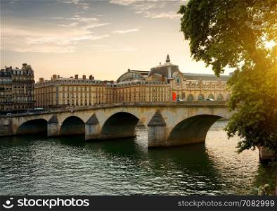 Bridge Orsay in Paris at sunny evening, France