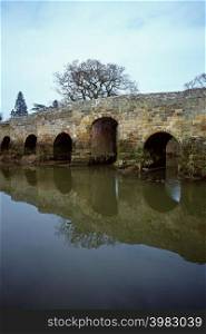 Bridge reflected in river