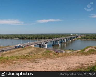 Bridge with cars at the entrance to Barnaul Russia.. Bridge with cars at the entrance to Barnaul Russia