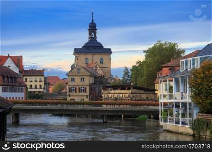 Bridges, Altes Rathaus and cloudy sky in Bamberg, Germany