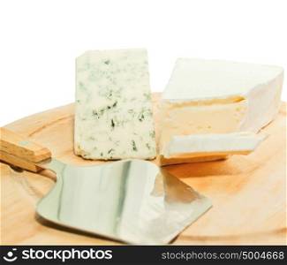 Brie and dor blue cheese on wooden desk with knife isolated
