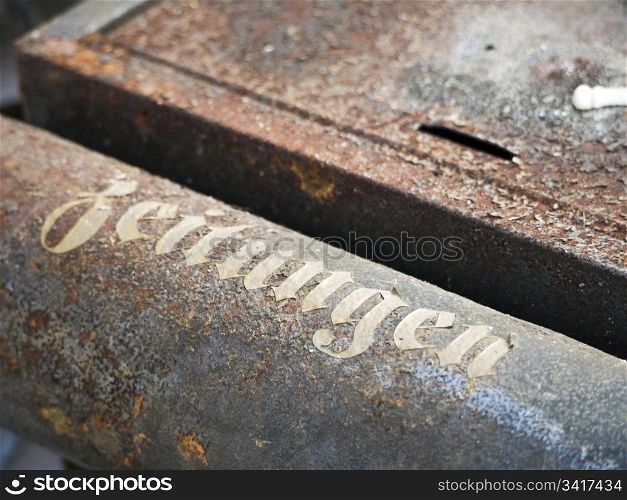 Briefkasten-Zeitungen. old rusty mailbox with german letters